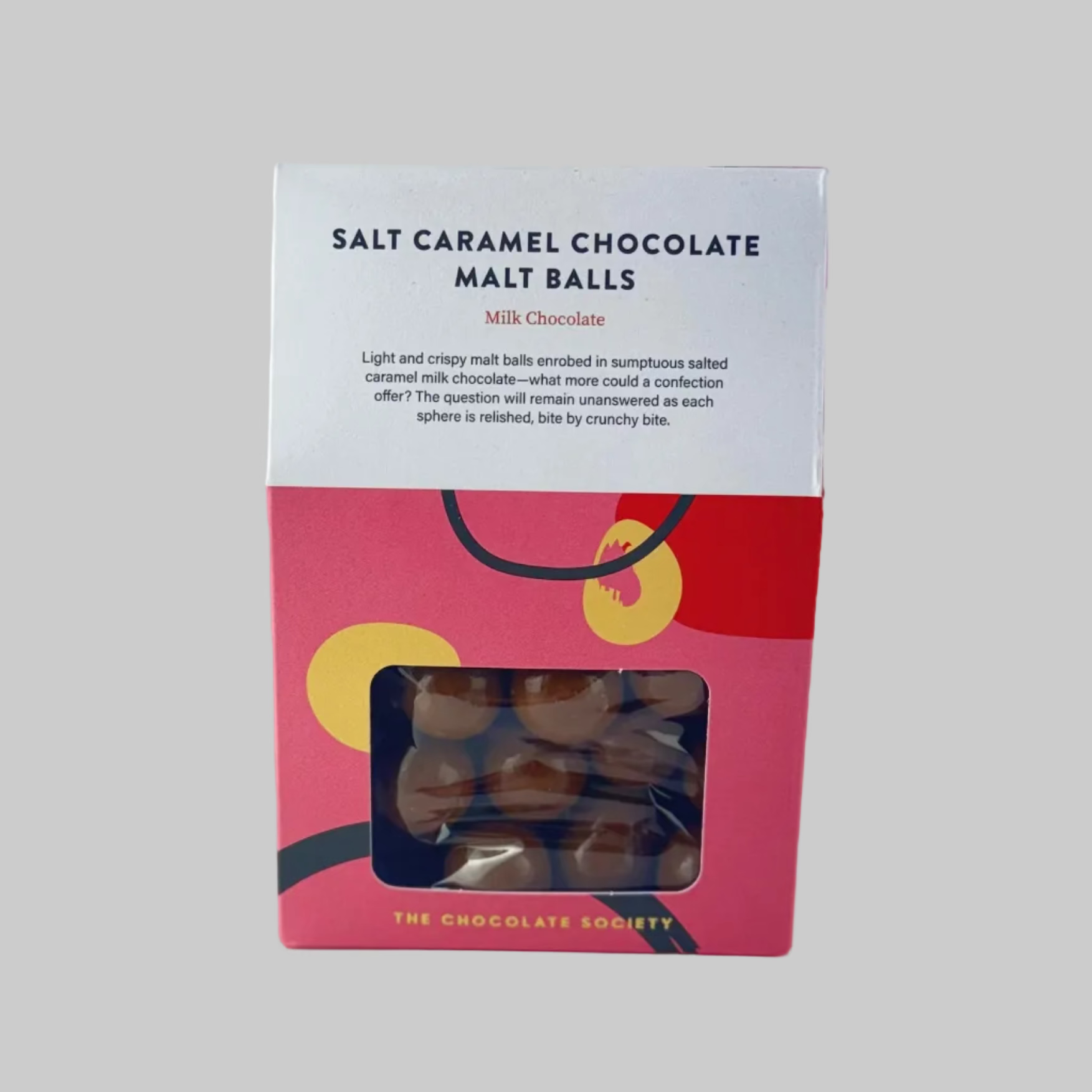 Box of salt caramel chocolate malt balls from The Chocolate Society on a white background

