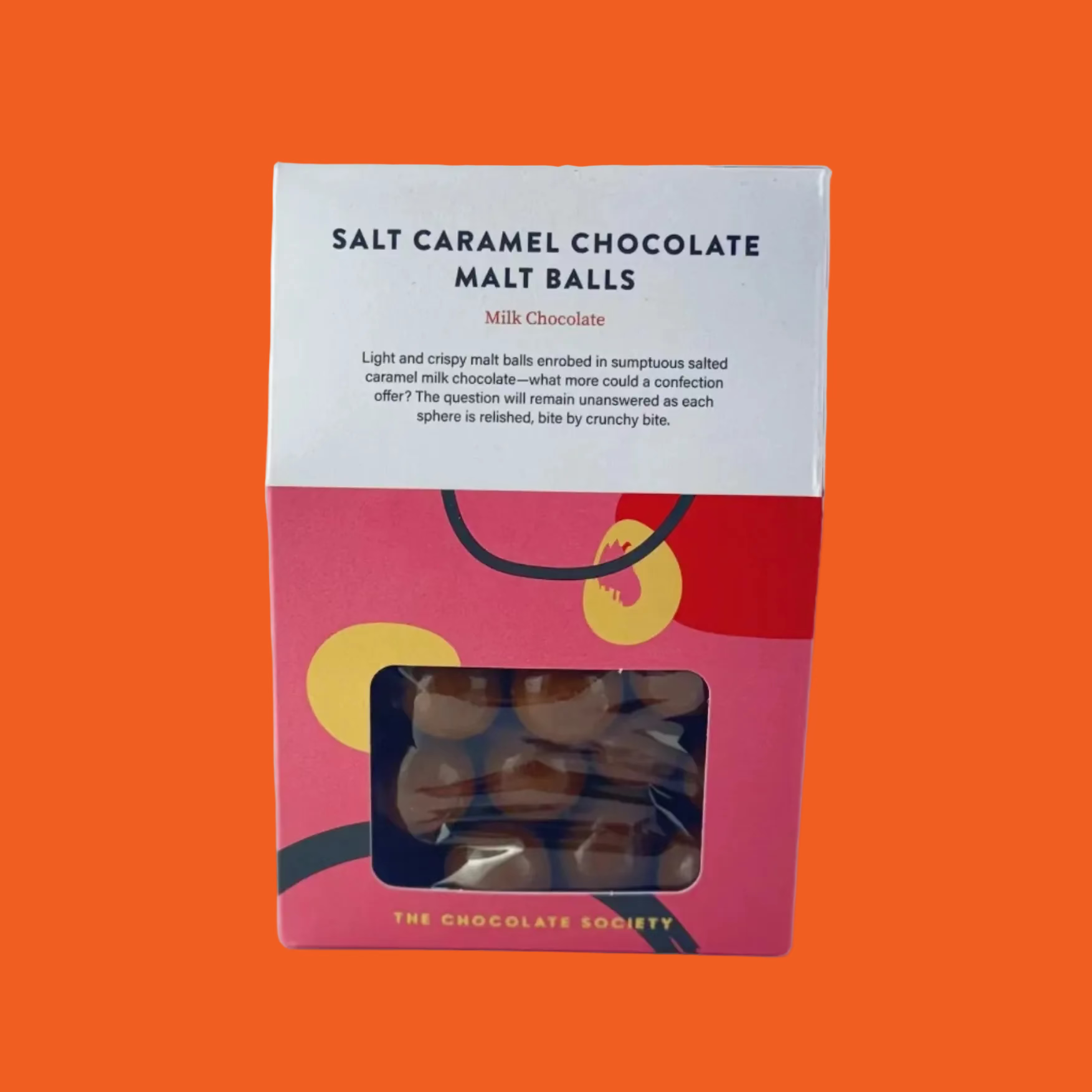 Box of Salt Caramel Chocolate Malt Balls with a pink and white design on a orange background