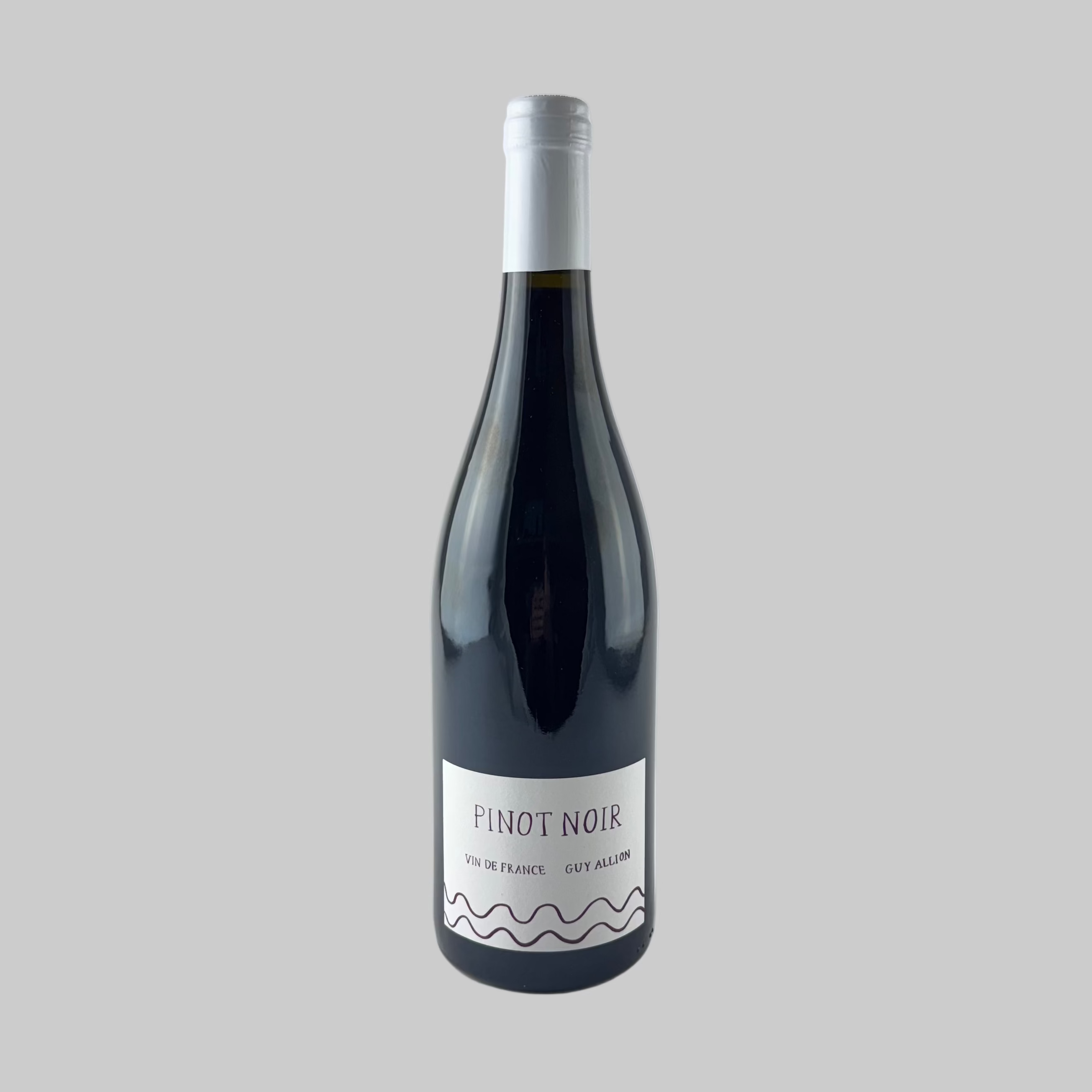Bottle of Guy Allion Pinot Noir with white label on a grey background