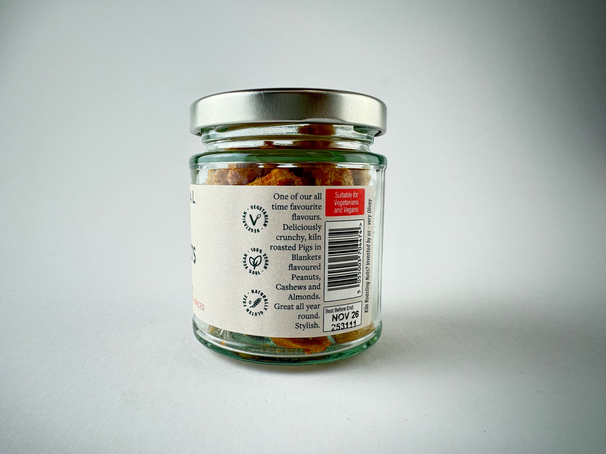 Close up of Pigs in Blanket Kiln Roasted Nuts snack packaging on a white background