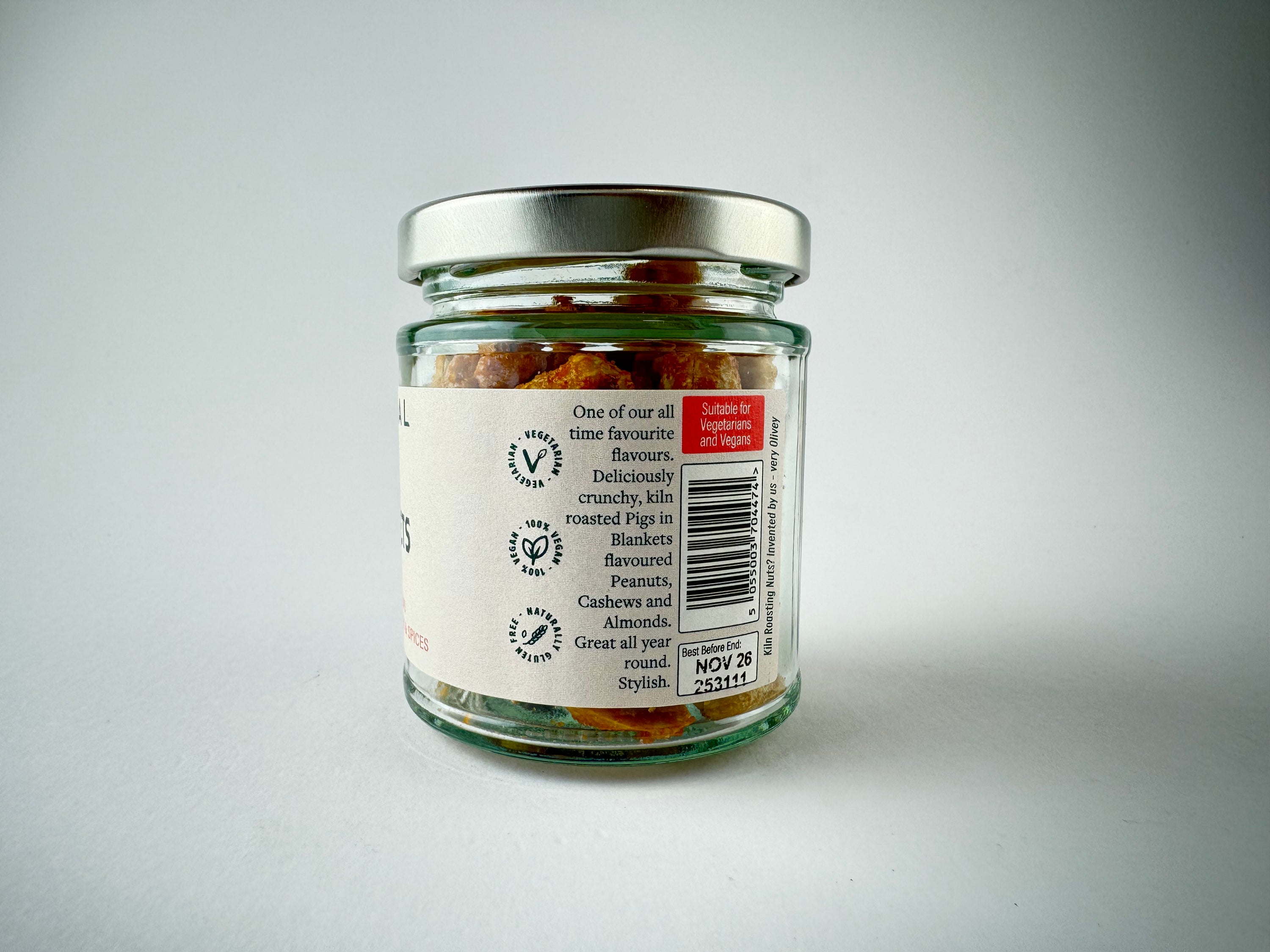 Close up of Pigs in Blanket Kiln Roasted Nuts snack packaging on a white background