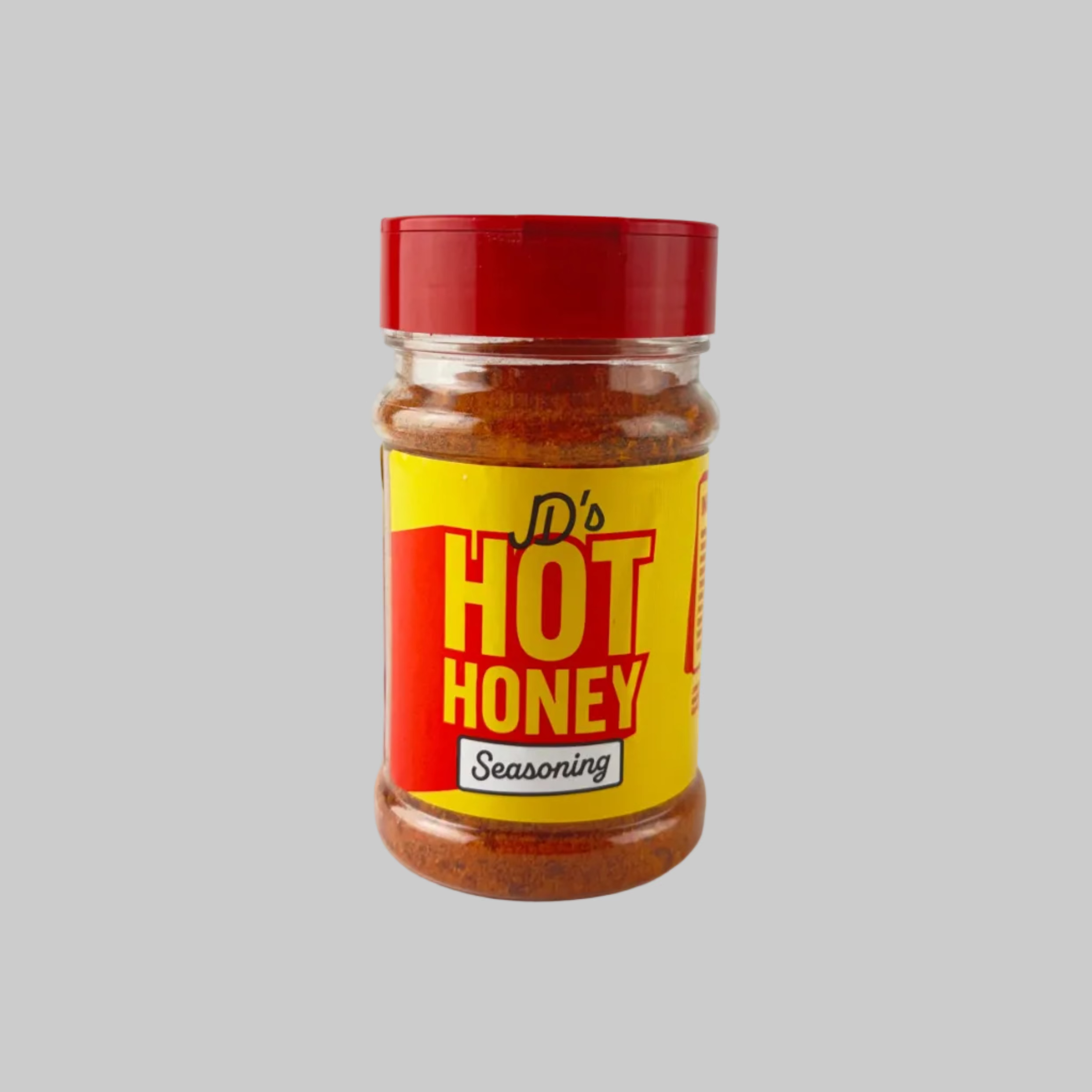 Jar of JD's Hot Honey Seasoning with red and yellow label on a white background