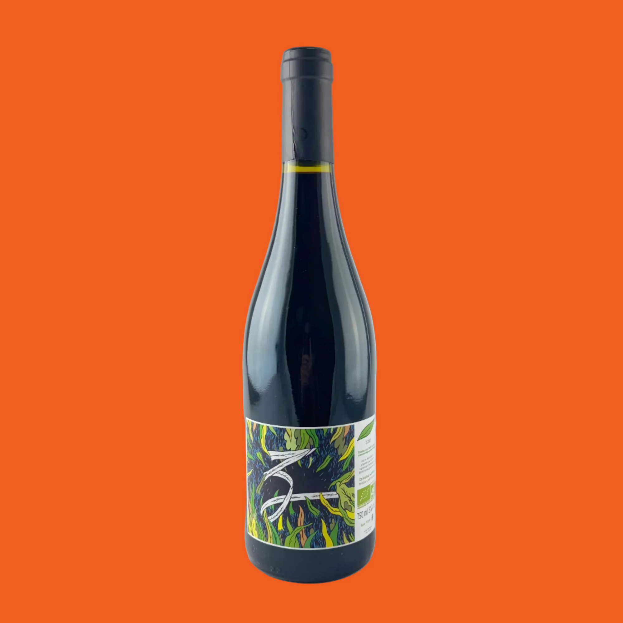 Wine bottle with a colourful label on a grey background