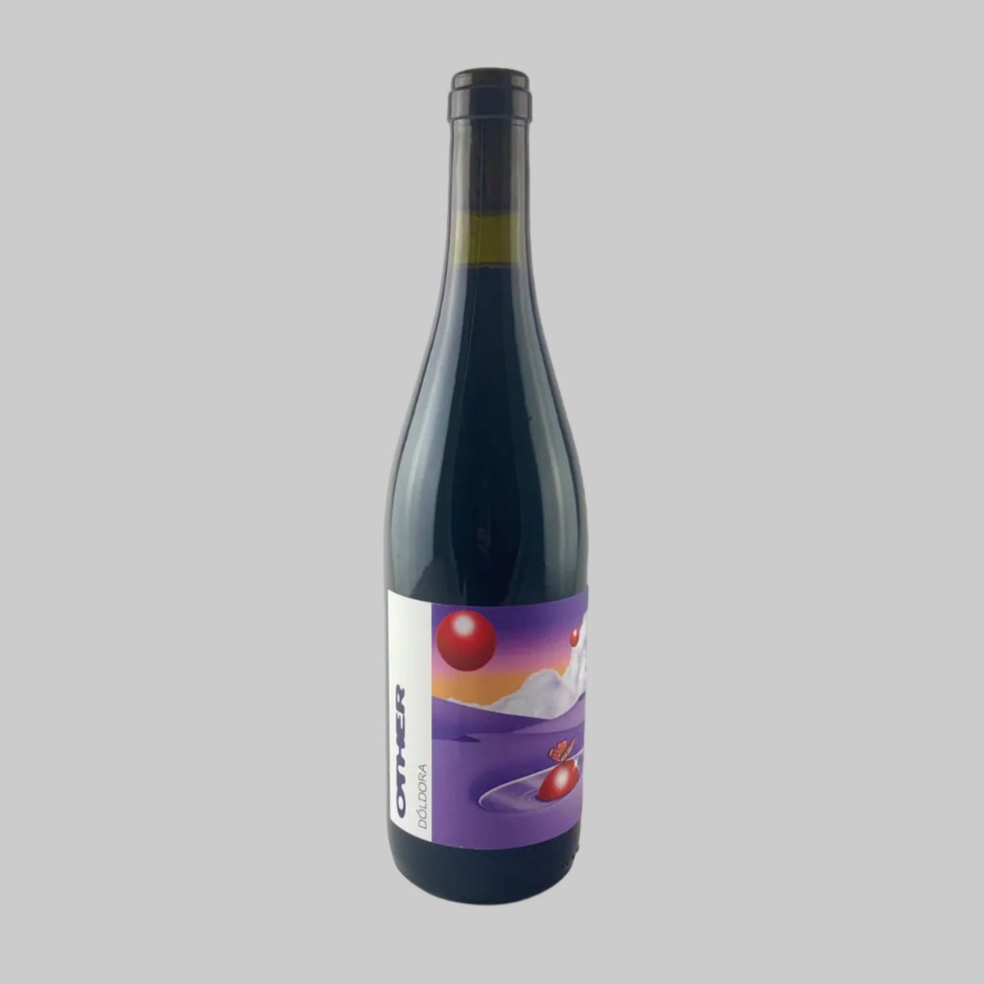 Bottle of Doldora from Other Wines with a colourful purple label on grey background 