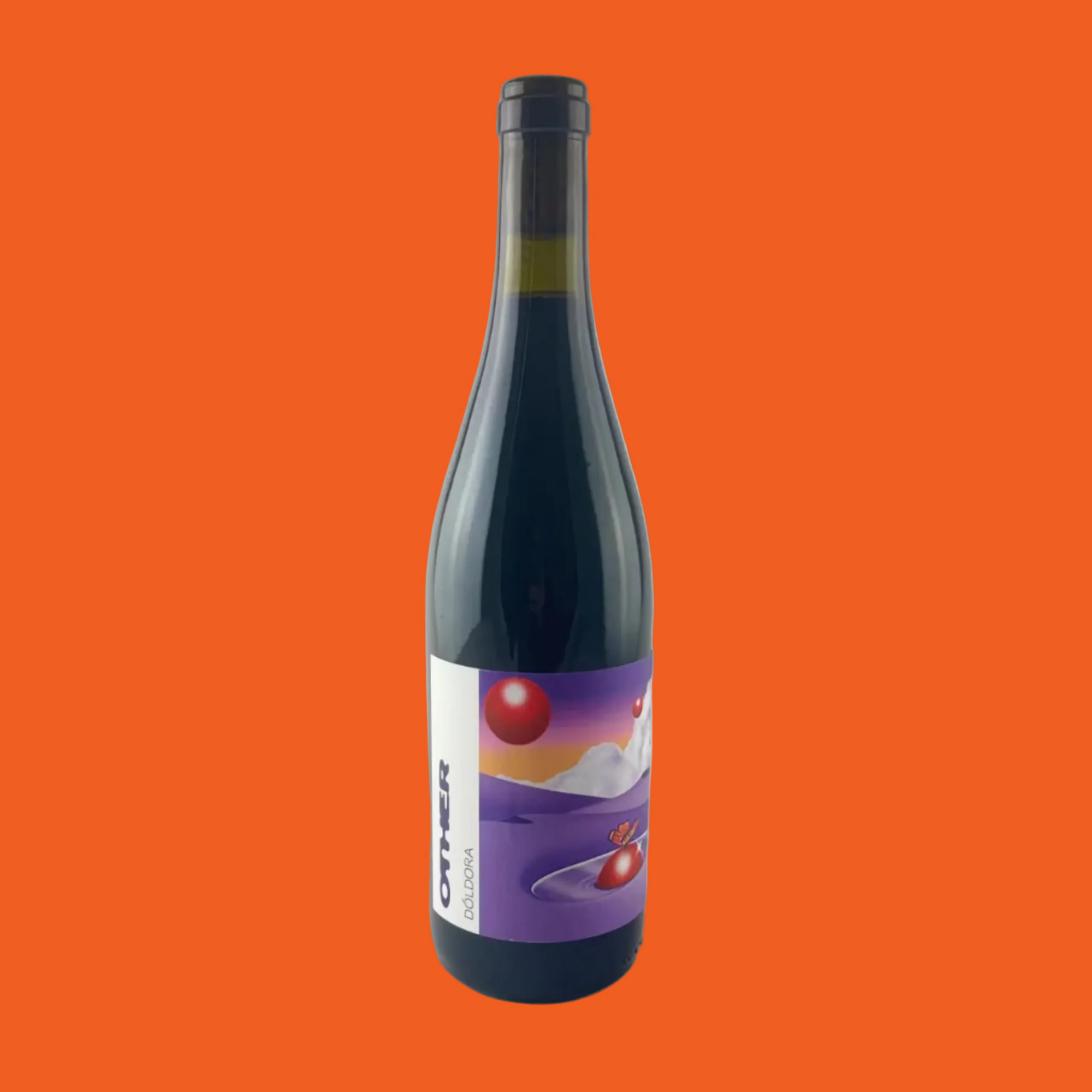 Bottle of Other Wines Doldora with a colourful purple label on a orange background