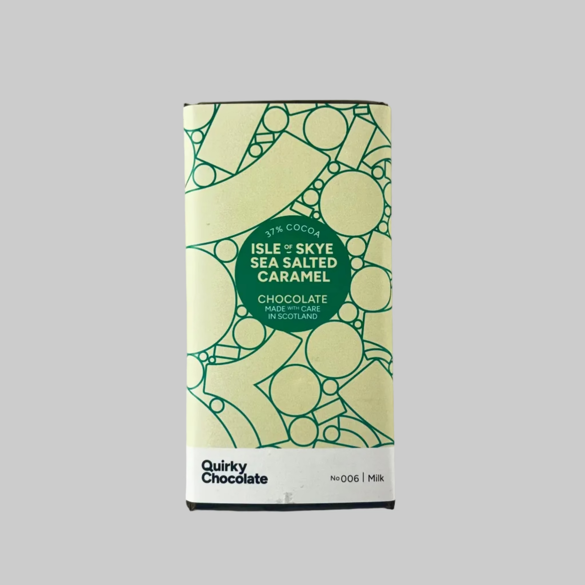 Bar of Quirky Chocolate Isle of Skye Sea Salted Caramel with geometric label on grey background