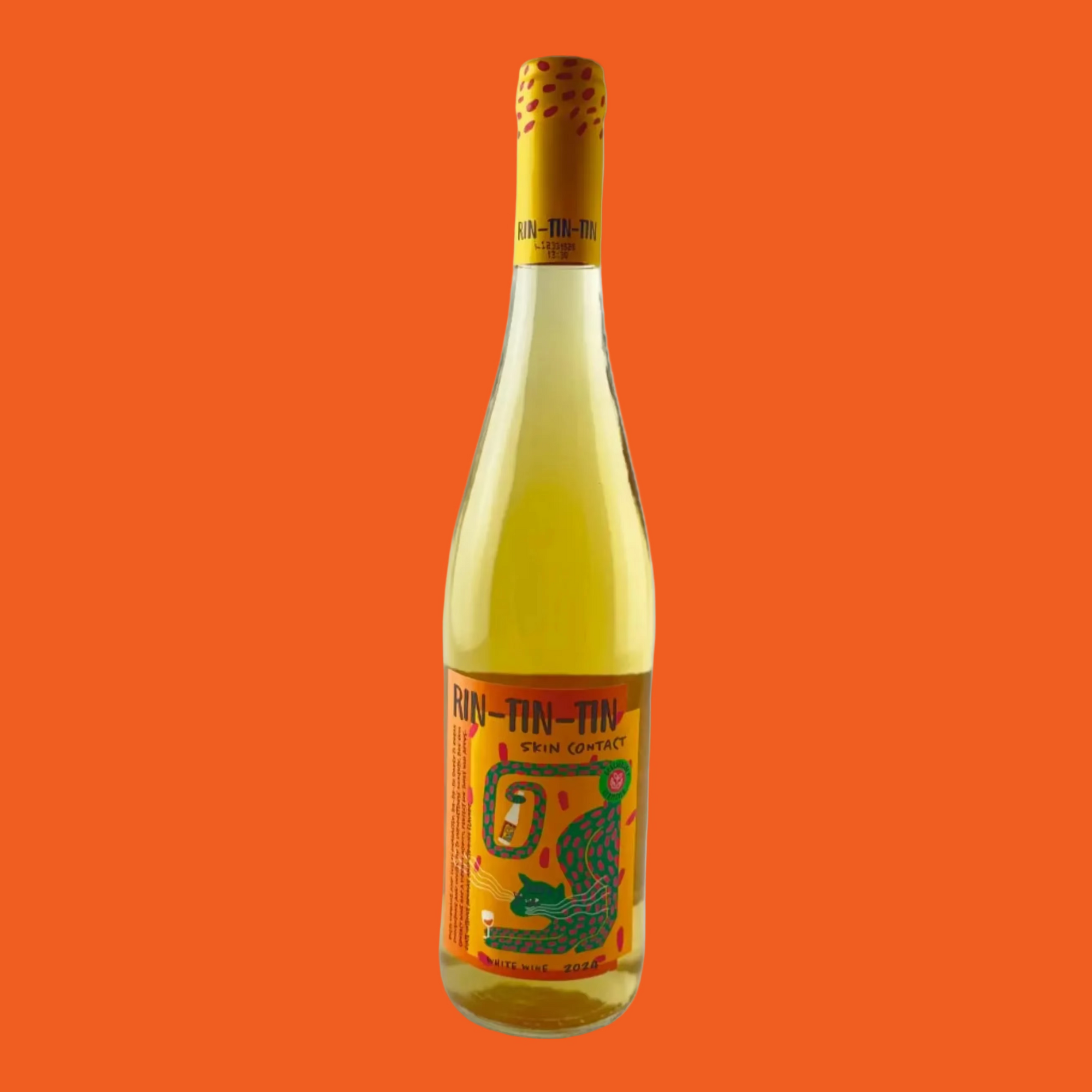 Bottle of orange wine with a colourful label on a orange background