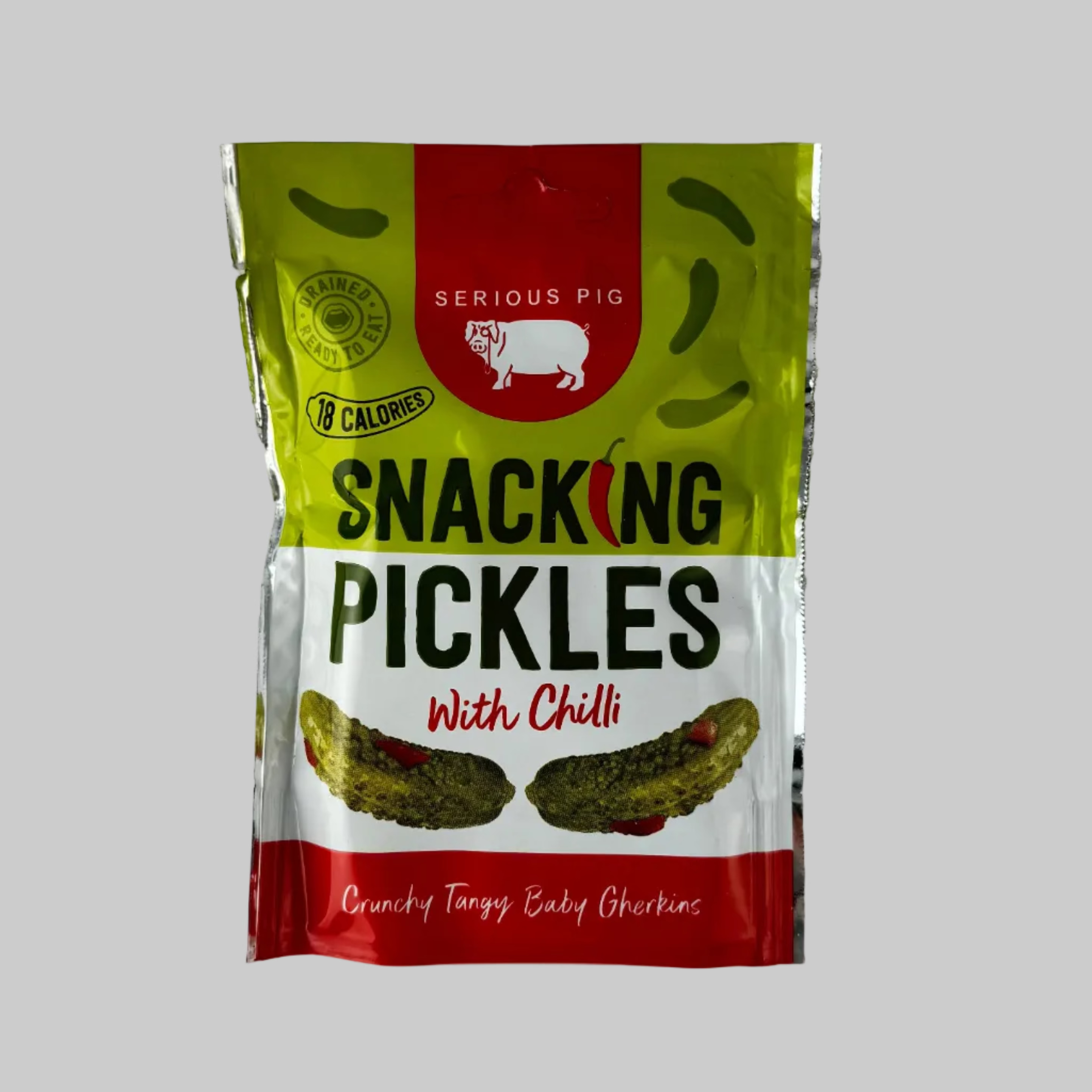 Packaged snacking pickles with Chilli on a grey background

