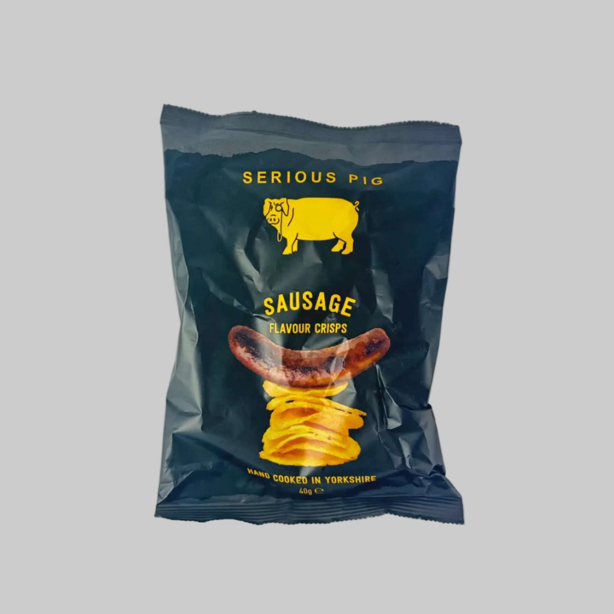 Packaged sausage flavor chips with 'Serious Pig' branding on a grey background
