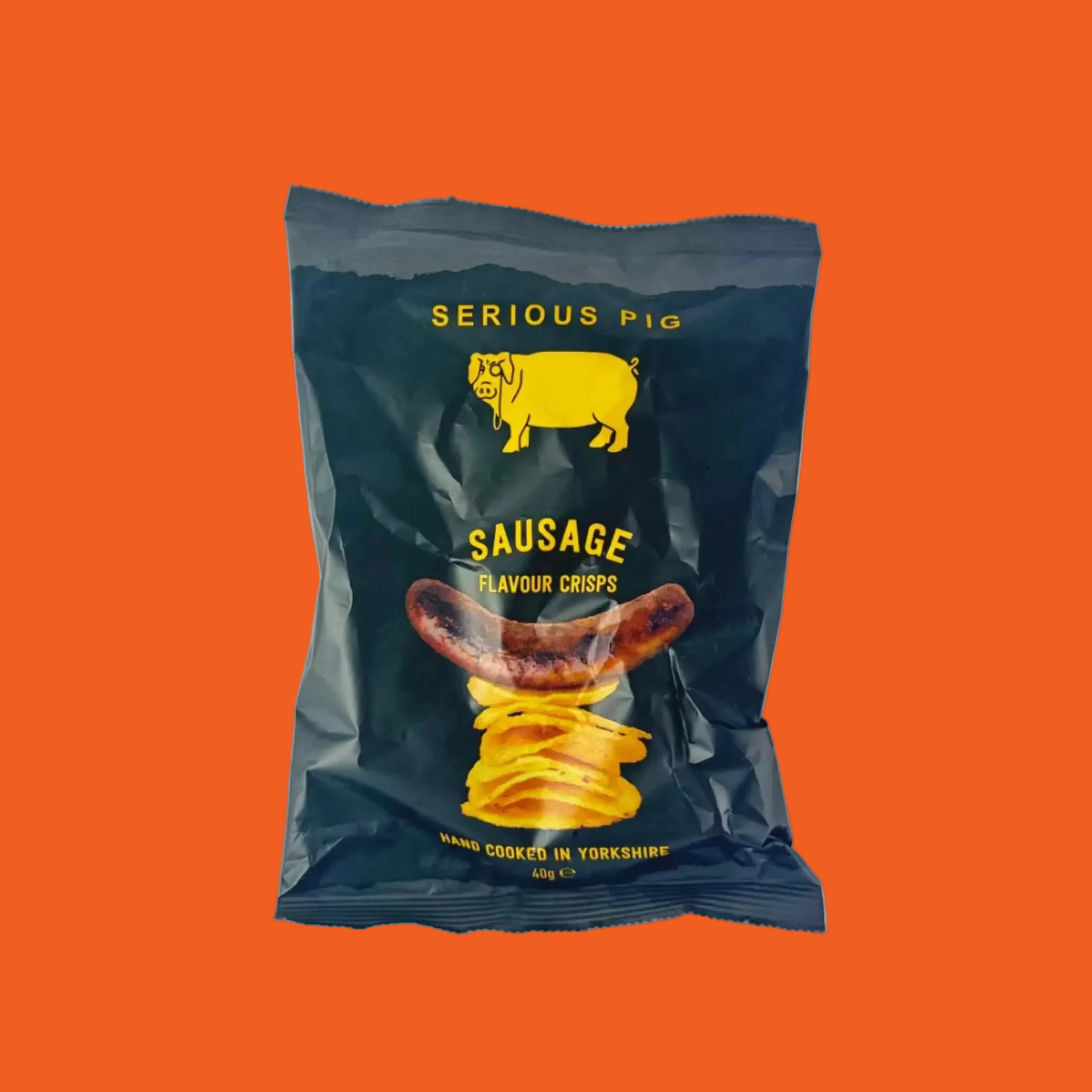Pack of Serious Pig sausage flavor crisps on an orange background