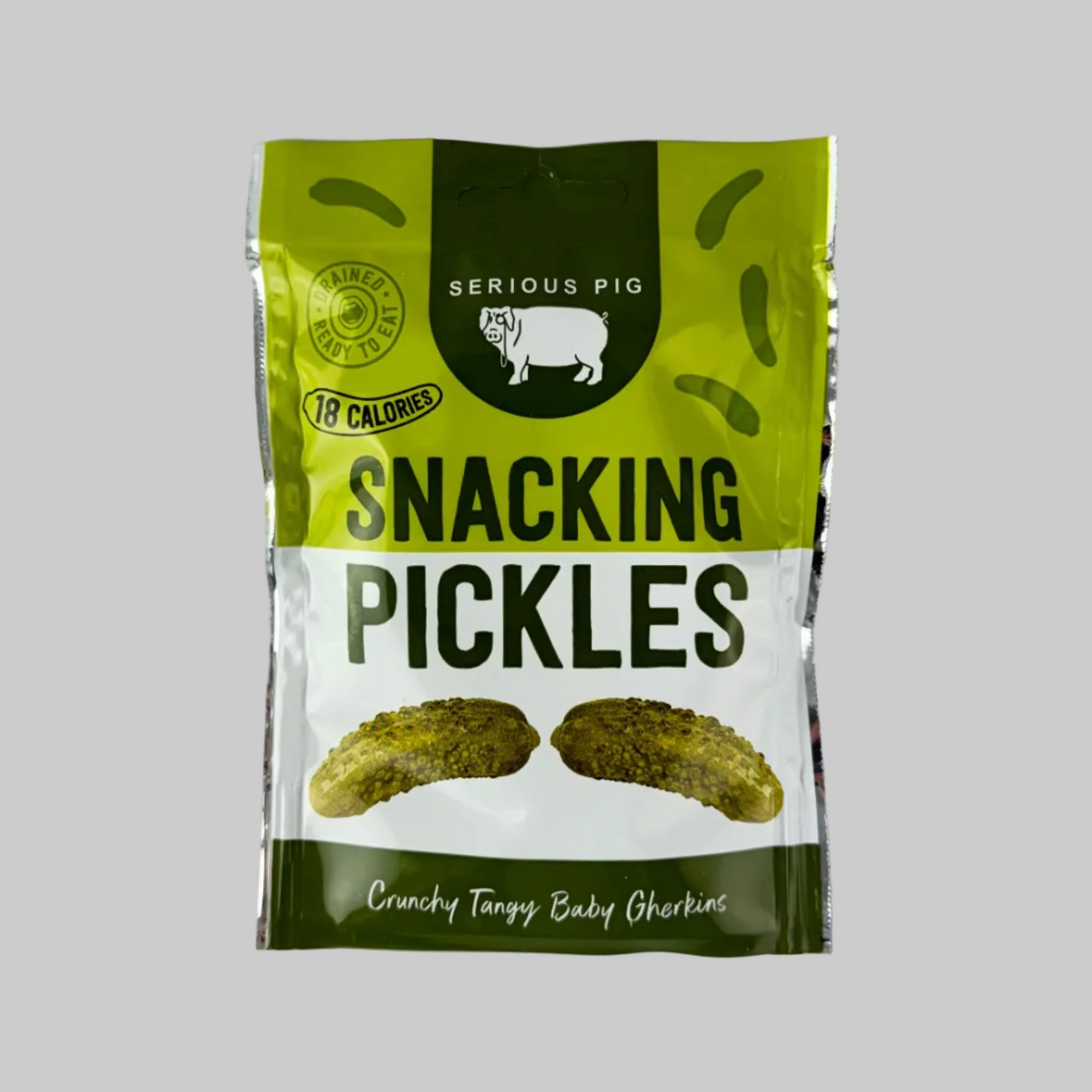 Packaged pickles with a green and white label on a white background