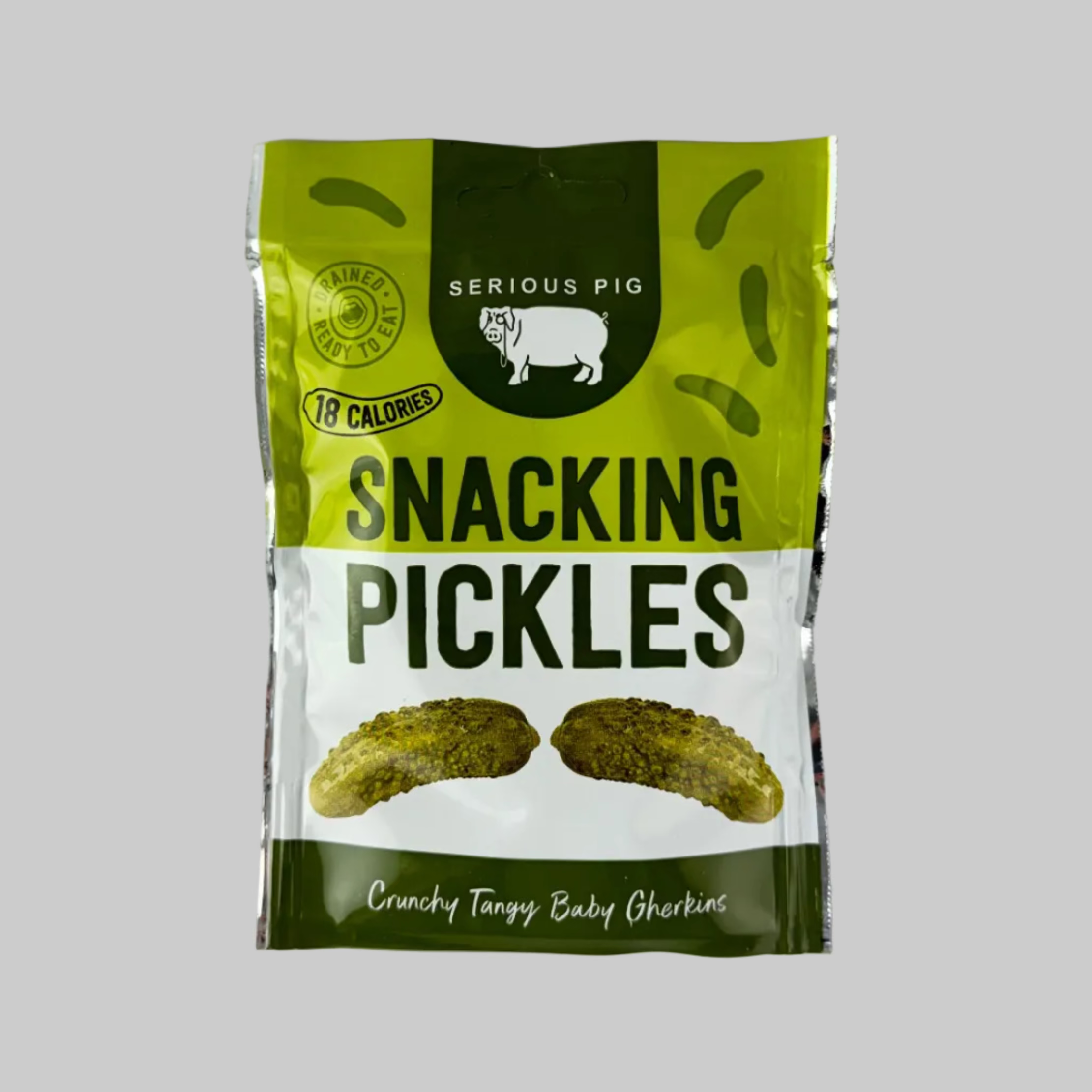 Packaged pickles with a green and white label on a white background