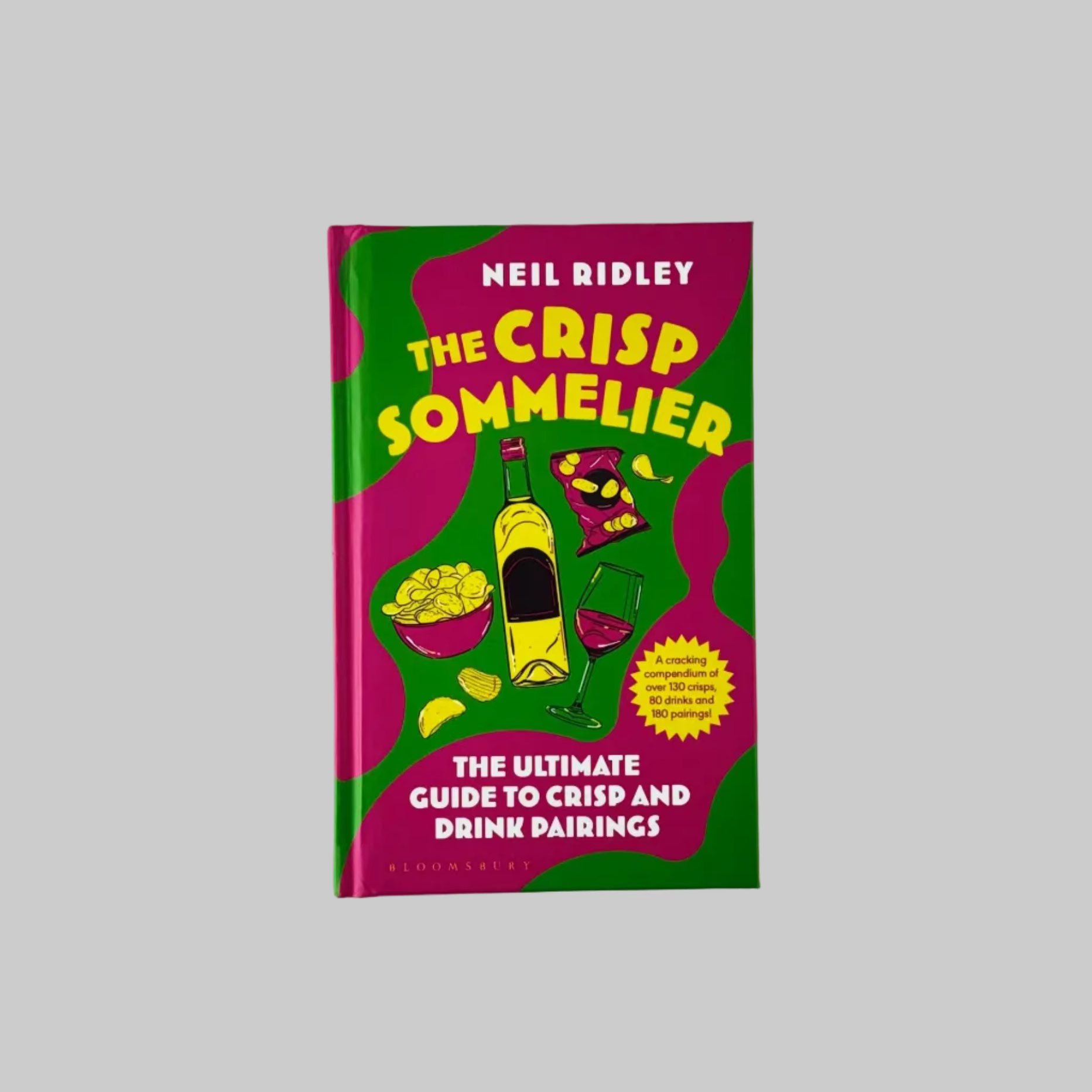 The Crisp Sommelier Book by Neil Ridley with a colourful green and pink cover on a grey background