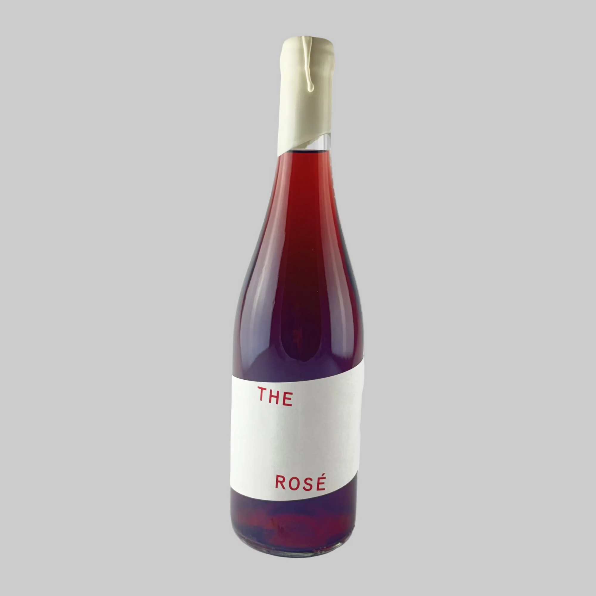 Bottle of 'The Rose' wine from The Wharie Experience on a grey background