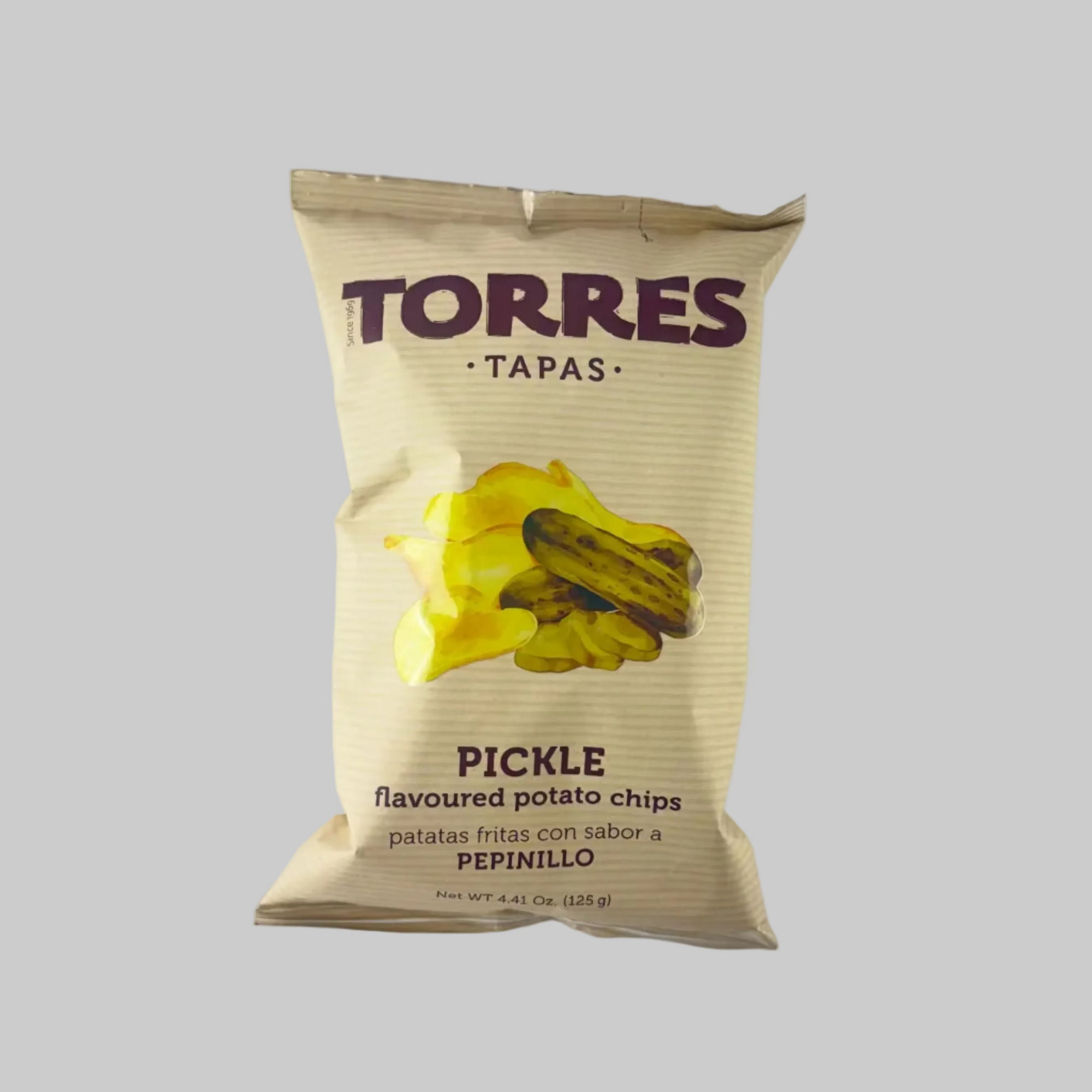 Torres Tapas Pickle flavoured potato chips in beige packaging on a grey background